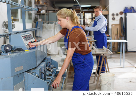 Adult female working in workroom Adult female working in workroom 48615525