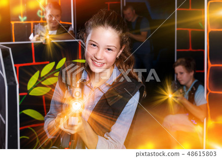 Glad girl aiming laser gun at other players Glad girl aiming laser gun at other players 48615803