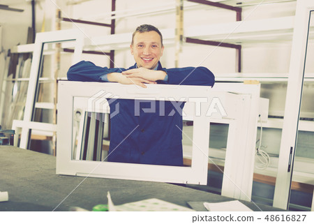 Ordinary labour demonstrating PVC profiles 48616827