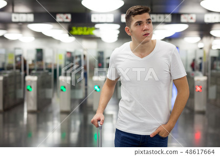 Passenger having difficulties with orientation in subway Passenger having difficulties with orientation in subway 48617664