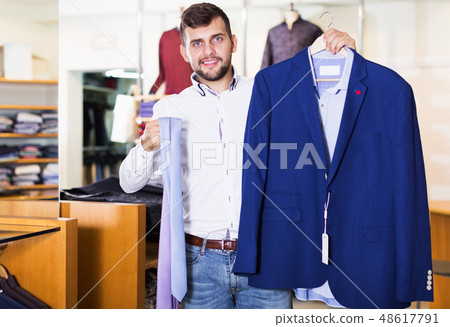 owner guy displaying jacket owner guy displaying jacket 48617791