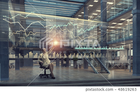 Businesswoman using media panel 48619263