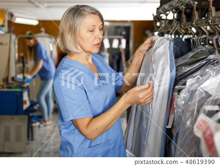 Portrait of dry-cleaning salon worker Portrait of dry-cleaning salon worker 48619390