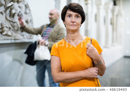 woman who is visiting museum 48619493