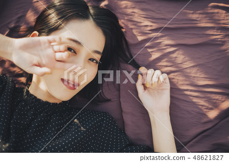 Woman rooftop portrait Woman rooftop portrait 48621827