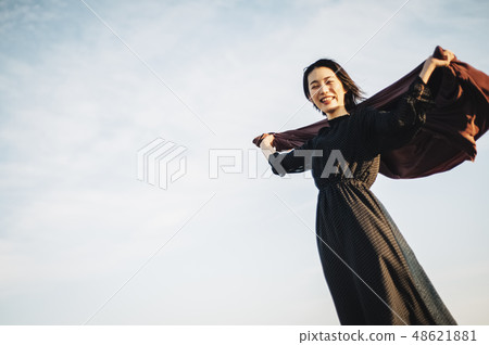 Woman rooftop portrait Woman rooftop portrait 48621881