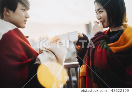 Couple rooftop lifestyle Couple rooftop lifestyle 48622109