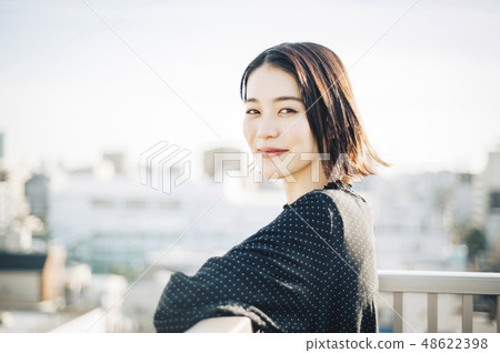 Women's rooftop lifestyle 48622398