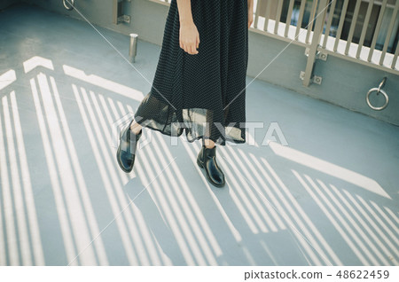 Ladies rooftop portrait Lower body 48622459