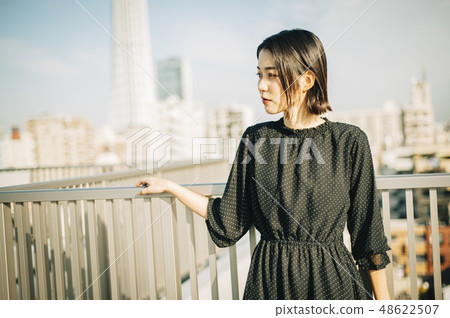 Woman rooftop portrait 48622507