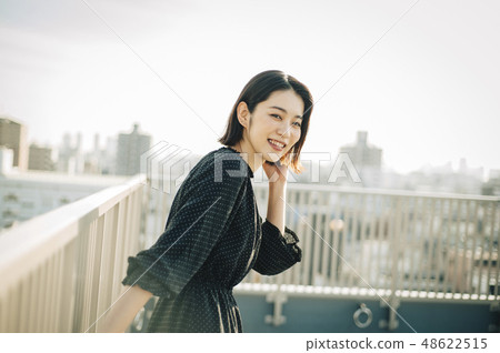 Woman rooftop portrait 48622515