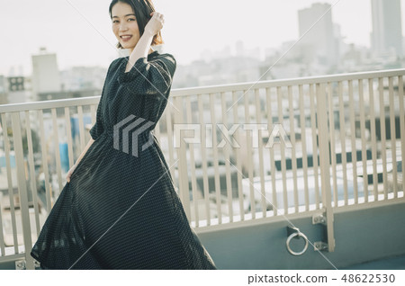 Woman rooftop portrait 48622530