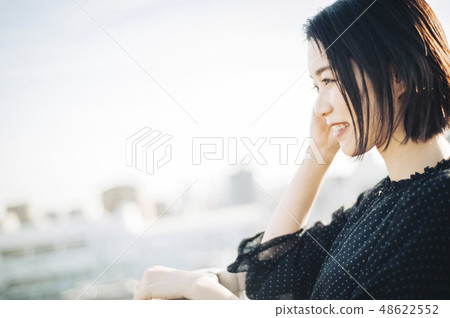 Women's rooftop lifestyle 48622552