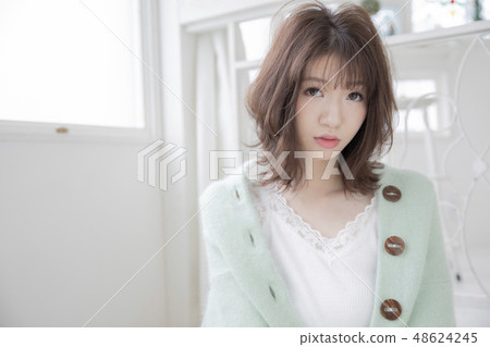 Medium curly hair Bob style woman Medium curly hair Bob style woman 48624245