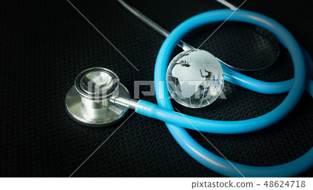 The stethoscopes on black background  48624718