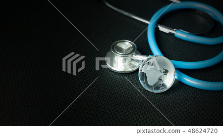 The stethoscopes on black background  48624720