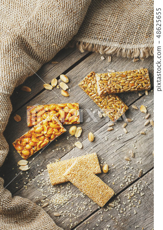 Mix of Gozinaki bar of seeds on a vintage back 48625655