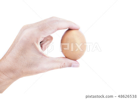 Man hand with egg isolated on white background Man hand with egg isolated on white background 48626538
