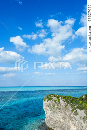 The clouds floating blue sky and cobalt blue sea The clouds floating blue sky and cobalt blue sea 48627632
