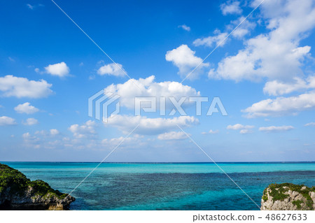 The clouds floating blue sky and cobalt blue sea The clouds floating blue sky and cobalt blue sea 48627633
