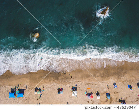 Beach with sun loungers on the coast of the ocean 48629047