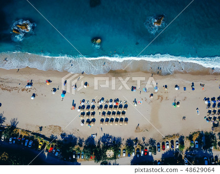 Beach with sun loungers on the coast of the ocean 48629064