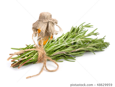 Rosemary essential oil with bunch. Rosemary essential oil with bunch. 48629959