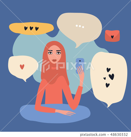 Lovely young beautiful Muslim woman wearing hijab holding mobile phone Modern communication 48630332