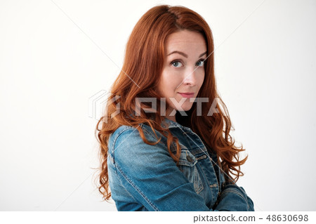 woman model with ginger hair posing indoors woman model with ginger hair posing indoors 48630698