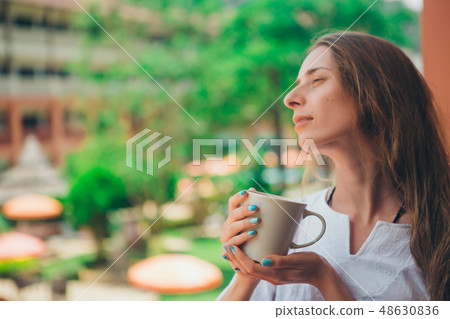 beautiful girl with long hair and blue manicure beautiful girl with long hair and blue manicure 48630836
