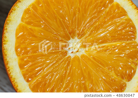 Orange in a cut close-up Orange in a cut close-up 48630847