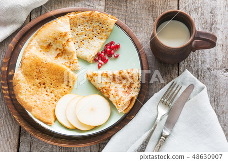Tasty russian breakfast of pancakes with hone. Tasty russian breakfast of pancakes with hone. 48630907