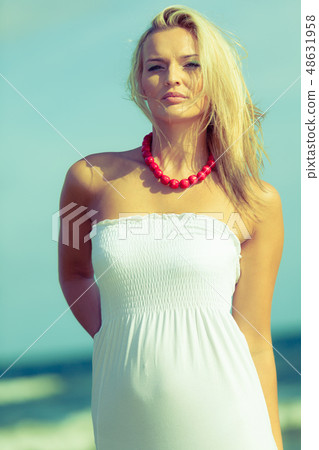 Nice female enjoying nature and beach. Nice female enjoying nature and beach. 48631958