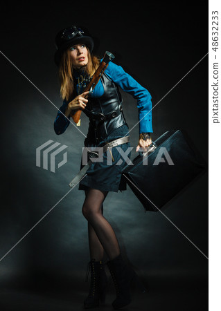 Vintage girl with gun. Vintage girl with gun. 48632233