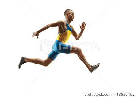 Young caucasian man running or jogging isolated on white studio background. 48633492
