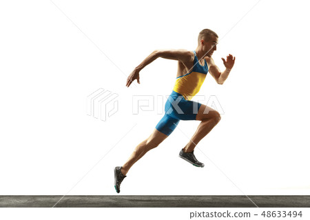 Young caucasian man running or jogging isolated on white studio background. 48633494