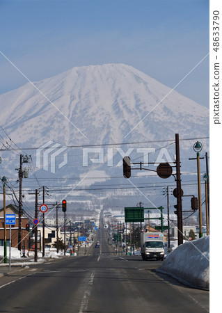 Photographed landscape of Makkari city area and Mt. Yotei (Ezo Fuji) in Makkari village in Hokkaido early spring 48633790