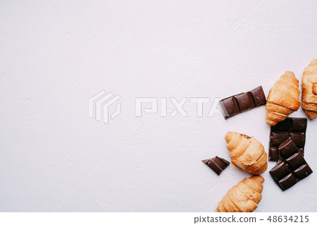 chocolate and croissants background, confectionery chocolate and croissants background, confectionery 48634215