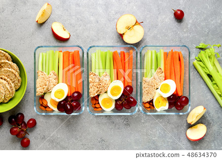 Lunch boxes with healthy snacks, overhead view 48634370