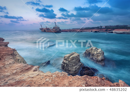Rocks in sea with abandoned ship, Paphos, Cyprus 48635202