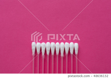 Closeup top view on cotton buds laid in a Closeup top view on cotton buds laid in a 48636132
