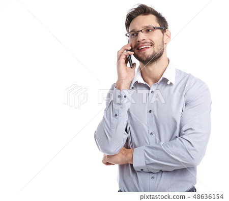 Young man talking on mobilephone. 48636154