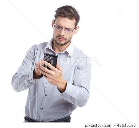 Young man talking on mobilephone. 48636156