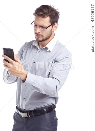 Young man talking on mobilephone. 48636157