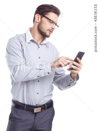 Young man talking on mobilephone. 48636158