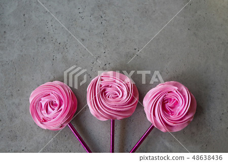Cool sweet meringues in the roses form 48638436