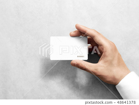 Hand hold blank white loyalty card mockup with rounded corners 48641378