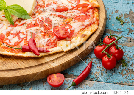 Hot homemade Italian pizza Hot homemade Italian pizza 48641743