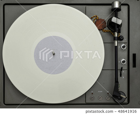 Vintage vinyl turntable with vinyl plate. Listen to music. Top view. 48641916