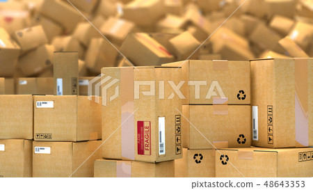 Hundreds of cardboard parcels lying on a heap 48643353